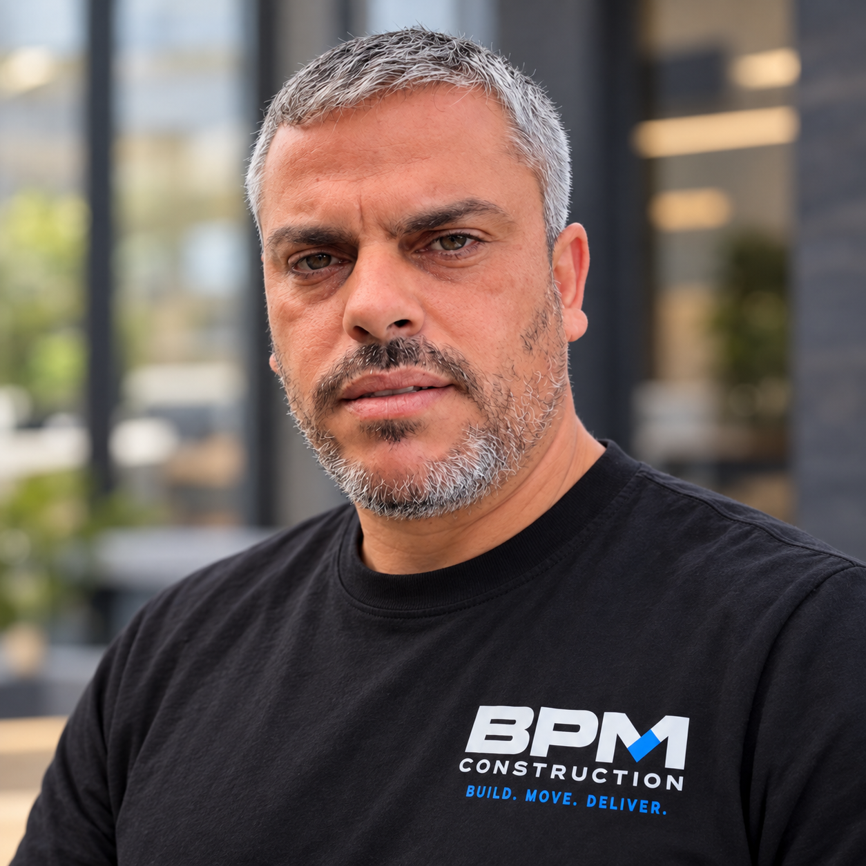 Binyamin Levi, founder and owner of BPM Construction, wearing a BPM shirt